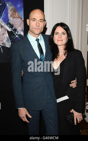 Mark Strong and his wife Liza Marshall arrive at the Empire Film Awards at the Grosvenor House Hotel in London. Stock Photo