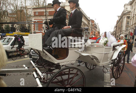 Lookie likies of Kate Middleton and Prince William arrive at Waterstones, Picadilly, London, for the launch of a new book 'Kate & Wills up the Aisle' by Alison Jackson. Stock Photo