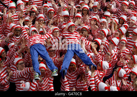 A crowd of people dressed as 'Where's Wally' in Dublin, for the launch of the Where's Wally World Record, which runs as part of the Street Performance World Championship which takes place at Fitzgerald Park, Cork City and The People's Park, Portlaoise on June 11th-12th and at Dublin's Merrion Square on June 16th-19th this year. Stock Photo