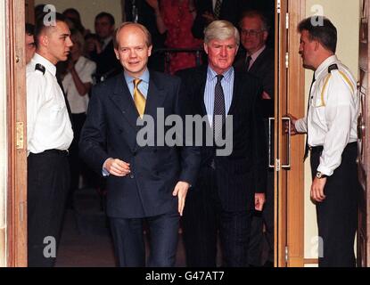 New Conservative Party leader William Hague emerges from Conservative Central Office in London with the new Party Chairman Lord Cecil Parkinson who was appointed this morning. Picture by Stefan Rousseau Stock Photo