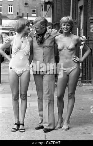 Actor Leslie Phillips (c) with co-stars of the West End comedy 'Sextet' Angela Scoular (l) and Carol Hawkins (r). The ladies were choosing new swimsuits for the show from Nelbarden's 1978 range, Leslie Phillips had gone along to offer his manly views on the final choices. Angela and Carol wear swimsuits in several scenes of the play, which involves six people holidaying on board a luxury Mediterranean cruiser. Leslie Phillips would go on to marry Angela Scoular in 1982. Stock Photo