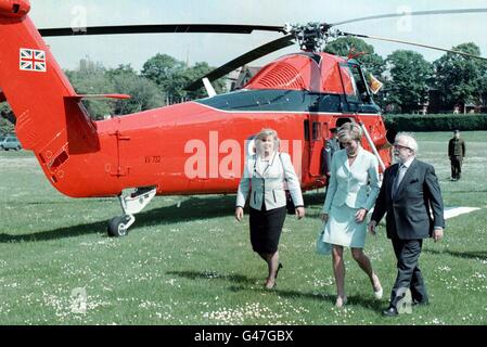 Diana, the Princess of Wales with her lady in waiting Anne Beckwith-Smith and Lord Richard Attenborough, after she arrived by Royal helicopter during her visit to the Richard Attenborough Centre, which she opened in Leicester this morning (Tuesday). PHOTOGRAPH BY JOHN STILLWELL/PA. Stock Photo