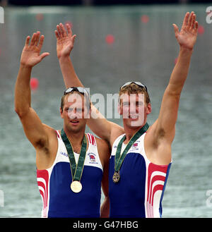 Rowing - Atlanta Olympic Games 1996 - Men's Coxless Pairs - Final. Steve Redgrave (left) and Matthew Pinsent with their gold medals after winning the coxless pairs at the 1996 Olympics in Atlanta, USA.