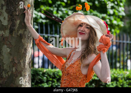 Ascot, UK. 16th June, 2016. A racegoer dressed for Ladies Day at Royal Ascot. Stock Photo