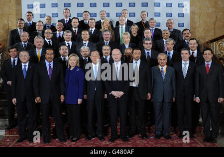 British Foreign Secretary William Hague (front centre) poses for a family photograph with other foreign ministers at the start of the Libya conference in London.