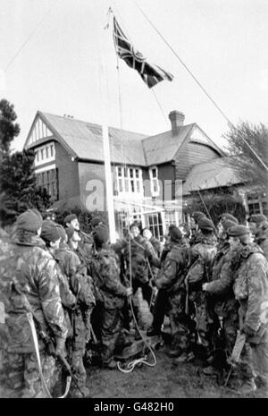 Royal Marines raise the Union flag again at Government House in Port Stanley on the 14/06/82 after the surrender of the Argentine forces in the Falklands war. * 15/6/97 Baroness Thatcher was unveiling a plaque in memory of British servicemen who died in the Falklands war, which ended 15 years ago (14/6/97). She was attending a cermony in Gosport, Hants and unveiling the plaque on the shores of the Solent, where thousands of friends and relatives waved farewell to the departing ships and welcomed their crews home. Stock Photo