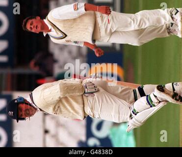 Showing where it hurts, Mike Gatting of Middlesex rubs the spot he was hit by a ball from Yorkshire bowler darren Gough during their Britannic Assurance Championship Match at Headingley today(Fri). Photo John Giles.PA. Stock Photo