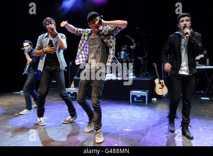 Big Time Rush (from left to right) Carlos Pena, James Maslow, Kendall Schmidt and Logan Henderson perform on stage at Shepherd's Bush Empire in west London. Stock Photo