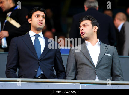 Queen Park Rangers chairman and Managing Director of QPR Holdings Limited Ishan Saksena (left) with vice chairman of QPR Holdings Limted Amit Bhatia (right). Stock Photo