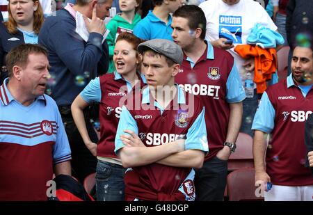 Soccer - Barclays Premier League - West Ham United v Manchester United - Upton Park. West Ham United fans in the stands Stock Photo