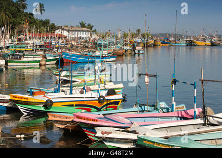 Sri Lanka, Mirissa colourfully painted fishing boats moored in Harbour Stock Photo