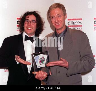 Comedians Steve Coogan and Paul O'Grady (aka Lily Savage) pose for the media during last night's (Saturday) British Comedy Awards. O'Grady won Best Entertainment Award for An Evening with Lily Savage. Photo by Rebecca Naden/PA. see PA story SHOWBIZ Awards Stock Photo