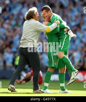 Soccer - FA Cup - Final - Manchester City v Stoke City - Wembley Stadium. Massimo Battara, Manchester City goalkeeping coach (left) celebrates with goalkeepers Joe Hart and Shay Given (right) after the final whistle Stock Photo