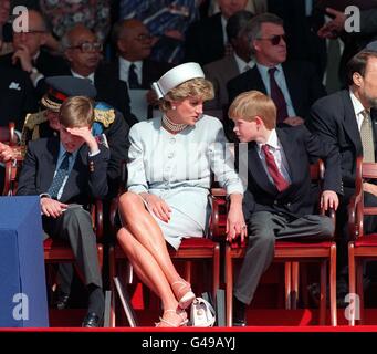 The Princess of Wales with her sons Prince William (left) and Prince Harry during the second day of celebrations commemorating the 50th Anniversary of VE Day in London's Hyde Park. Stock Photo