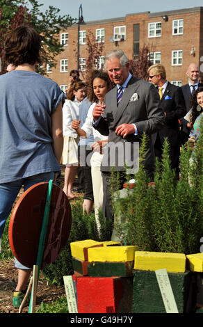 The Prince of Wales tours the Common Good City Farm in LeDroit Park in Washington DC on the first day of his visit to the US. Stock Photo