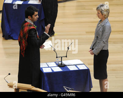 SNP MSP Humza Yousaf takes the oath of allegiance during the first day of parliamentary business at the Scottish Parliament, Edinburgh. Stock Photo