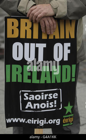 A placard as members of the Irish Republican Group Eirigi on O'Connell Street, Dublin, protest against the visit of Queen Elizabeth II to Ireland. Stock Photo