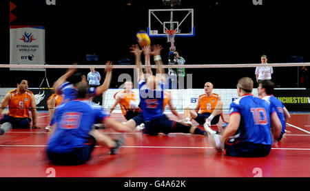 Action from the Sitting Volleyball Exhibition Match between Great Britain and The Netherlands during the Paralympic World Cup in Manchester. Stock Photo