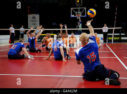 Paralympics - BT Paralympic World Cup 2011 - Day Three - Manchester. Action from the Sitting Volleyball Exhibition Match between Great Britain and The Netherlands during the Paralympic World Cup in Manchester. Stock Photo