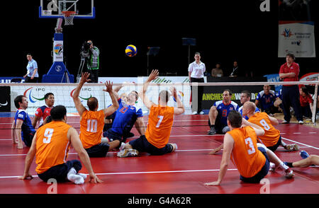 Paralympics - BT Paralympic World Cup 2011 - Day Three - Manchester. Action from the Sitting Volleyball Exhibition Match between Great Britain and The Netherlands during the Paralympic World Cup in Manchester. Stock Photo