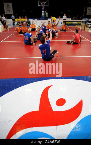 Action from the Sitting Volleyball Exhibition Match between Great Britain and The Netherlands during the Paralympic World Cup in Manchester. Stock Photo