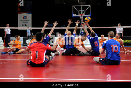 Action from the Sitting Volleyball Exhibition Match between Great Britain and The Netherlands during the Paralympic World Cup in Manchester. Stock Photo