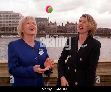 Newscaster Carole Barnes (left) attempts to juggle as TV presenter Selina Scott looks on during the launch today (Monday) of the Securicor Challengers Trophy 1998 - the premier inter-business training event - on terrace at the House of Commons. The annual three day competition, which is renowned for improving teamwork, communication and leadership skills, will be held near Dartmoor from 4-6th June. Photo by Stefan Rousseau/PA Stock Photo
