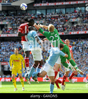 Soccer - FA Cup - Final - Manchester City v Stoke City - Wembley Stadium. Manchester City's goalkeeper Joe Hart (25) comes out to make a save in the final minutes of the game. Stock Photo