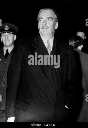 BRITISH FOREIGN MINISTER ANTHONY EDEN ARRIVES AT LONDON AIRPORT TODAY AFTER HIS PLANE HAD BEEN DELAYED BY BAD WEATHER FOLLOWING HIS FOURTEEN DAY VISIT TO JUGOSLAVIA AND AUSTRIA. MR. EDEN SAID HE WAS IMPRESSED BY THE DETERMINATION OF MARSHAL TITO AND THE JUGOSLAV LEADERS TO KEEP THEIR COUNTRY UNITED AND FREE Stock Photo