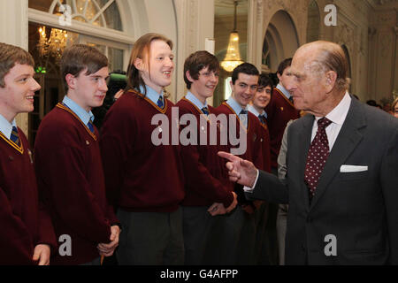 The Duke of Edinburgh meets students from St Declan's College in Dublin at a reception for members of Gaisce the President's Award at Farmleigh House. Stock Photo
