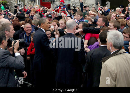US President Barack Obama greets well wishers in Moneygall, County Offaly, during his visit to Ireland. Stock Photo