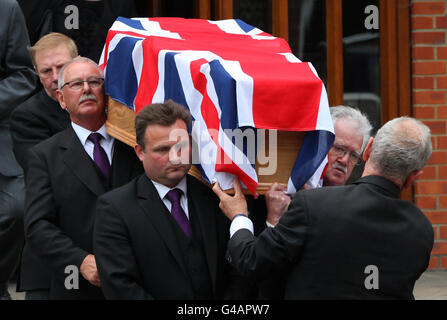 The coffin of boxer Sir Henry Cooper leaves Corpus Christi Catholic ...