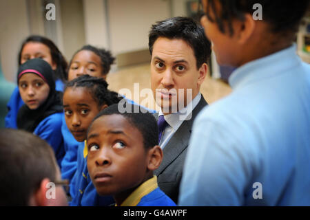 Labour leader Ed Miliband meets school children during a visit to the Michael Faraday School in Southwark, south east London today. Stock Photo