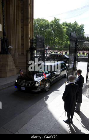 The Lord Great Chamberlain, the Marquess of Cholmondeley (right), and Gentleman Usher of the Black Rod Lieutenant General David Leakey wait for US President Barak Obama's car as he arrives at the Palaces of Westminster to address both Houses as part of his State Visit to the UK. Stock Photo