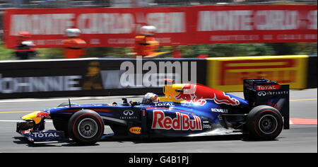 Germany's Sebastian Vettel on his way to victory in a Red Bull during the Monaco Grand Prix at the Circuit de Monaco, Monte Carlo. Stock Photo