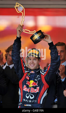 Germany's Sebastian Vettel of Red Bull, celebrates his victory during the Monaco Grand Prix at the Circuit de Monaco, Monte Carlo. Stock Photo