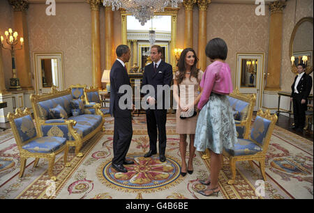 President of the United States Barack Obama (left) and First Lady Michelle Obama (right), meet with Prince William and the Duchess of Cambridge, at Buckingham Palace in London, on the first day of President Obama's three-day state visit to the UK. Stock Photo