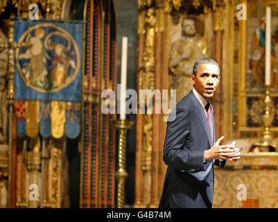 US President Barack Obama, stands in front of the High Altar, during a tour of Westminster Abbey, in central London, as part of his three-day state visit to the UK. Stock Photo