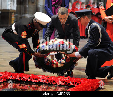 US President Barack Obama lays a wreath at the Grave of the Unknown Warrior, during a tour of Westminster Abbey, in central London, as part of his three-day state visit to the UK. Stock Photo