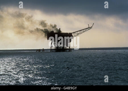 The Piper Alpha oil production platform on fire in the North Sea. Stock Photo