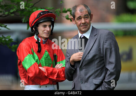 Horse Racing - Betfred Silver Bowl and Temple Stakes - Haydock Park. Jockey Ryan Moore (l) prior to his ride on Reflect in the Betfred 'Both Teams Score...Goals Galore!' Handicap Stock Photo