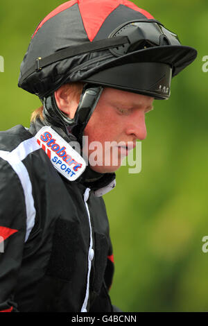 Horse Racing - TFI Friday - Nottingham Racecourse. Ross Atkinson, jockey Stock Photo