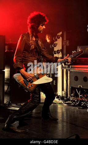 Frankie Poullain of The Darkness performs on stage at the O2 Shepherd's Bush Empire in west London, the band's first show in London after reuniting. Stock Photo