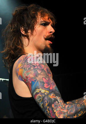 Justin Hawkins of The Darkness performs on stage at the O2 Shepherd's Bush Empire in west London, the band's first show in London after reuniting. Stock Photo