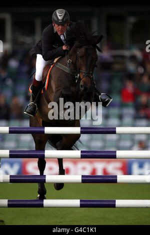 Tim Stockdale riding fresh Direct Kalico Bay in the Stoner Jewllers Vase jumping competition during the British Jumping Derby Meeting at the All England Jumping Course, Hickstead. Stock Photo