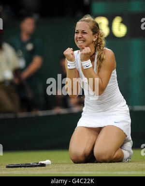 Germany's Sabine Lisicki celebrates defeating China's Na Li during day four of the 2011 Wimbledon Championships at the All England Lawn Tennis and Croquet Club, Wimbledon. Stock Photo