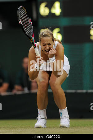 Germany's Sabine Lisicki celebrates defeating China's Na Li during day four of the 2011 Wimbledon Championships at the All England Lawn Tennis and Croquet Club, Wimbledon. Stock Photo