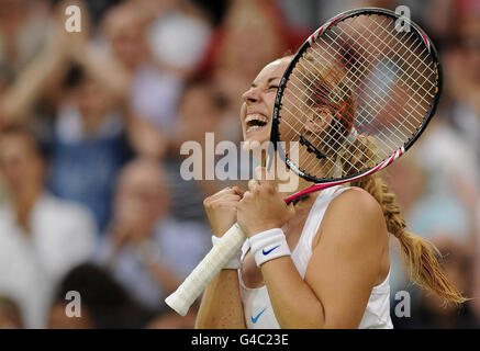 Germany's Sabine Lisicki celebrates defeating China's Na Li during day four of the 2011 Wimbledon Championships at the All England Lawn Tennis and Croquet Club, Wimbledon. Stock Photo