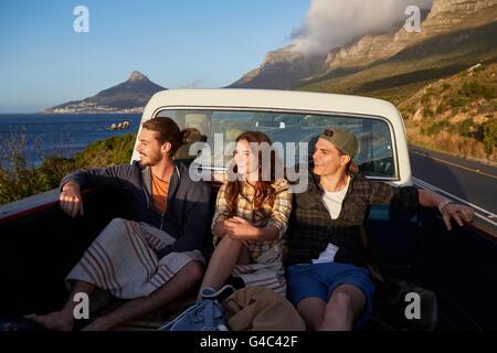 MODEL RELEASED. Young friends in pick up truck. Stock Photo