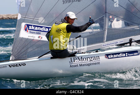 Sailing - Skandia Sail for Gold Regatta - Day Six. Great Britain's Ben Ainslie secures Gold during day six of the Skandia Sail for Gold Regatta in Weymouth, Dorset. Stock Photo